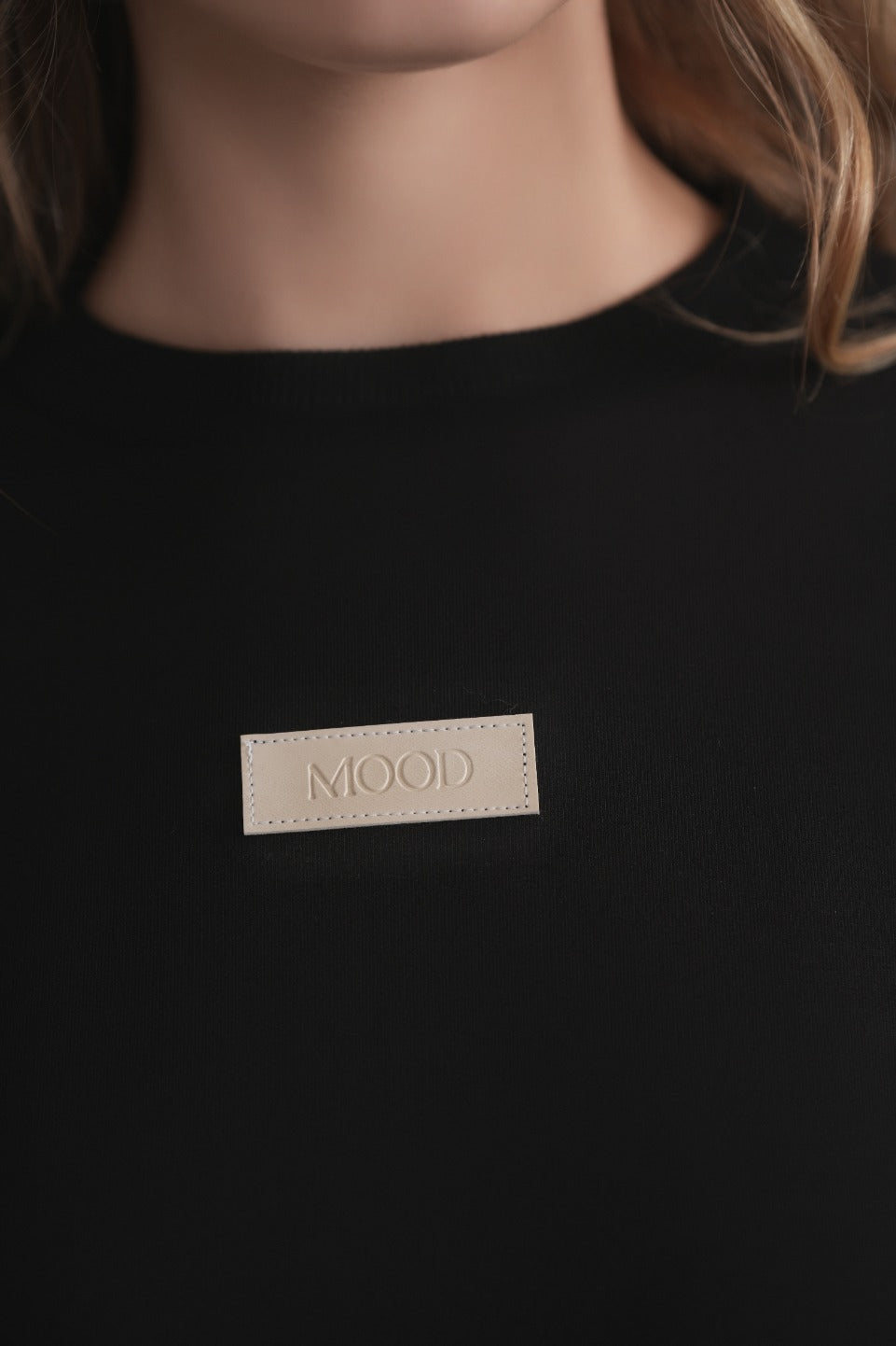 Schwarzes Sweatshirt mit geprägtem Lederlogo